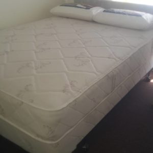 Image in Zeno Mattress show room of an Ultra foam queen size mattress.