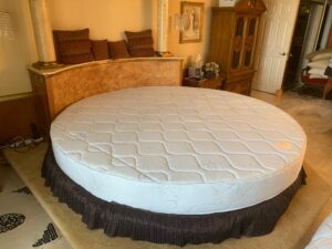 Custom Zeno mattress round in a luxurius home master bedroom.